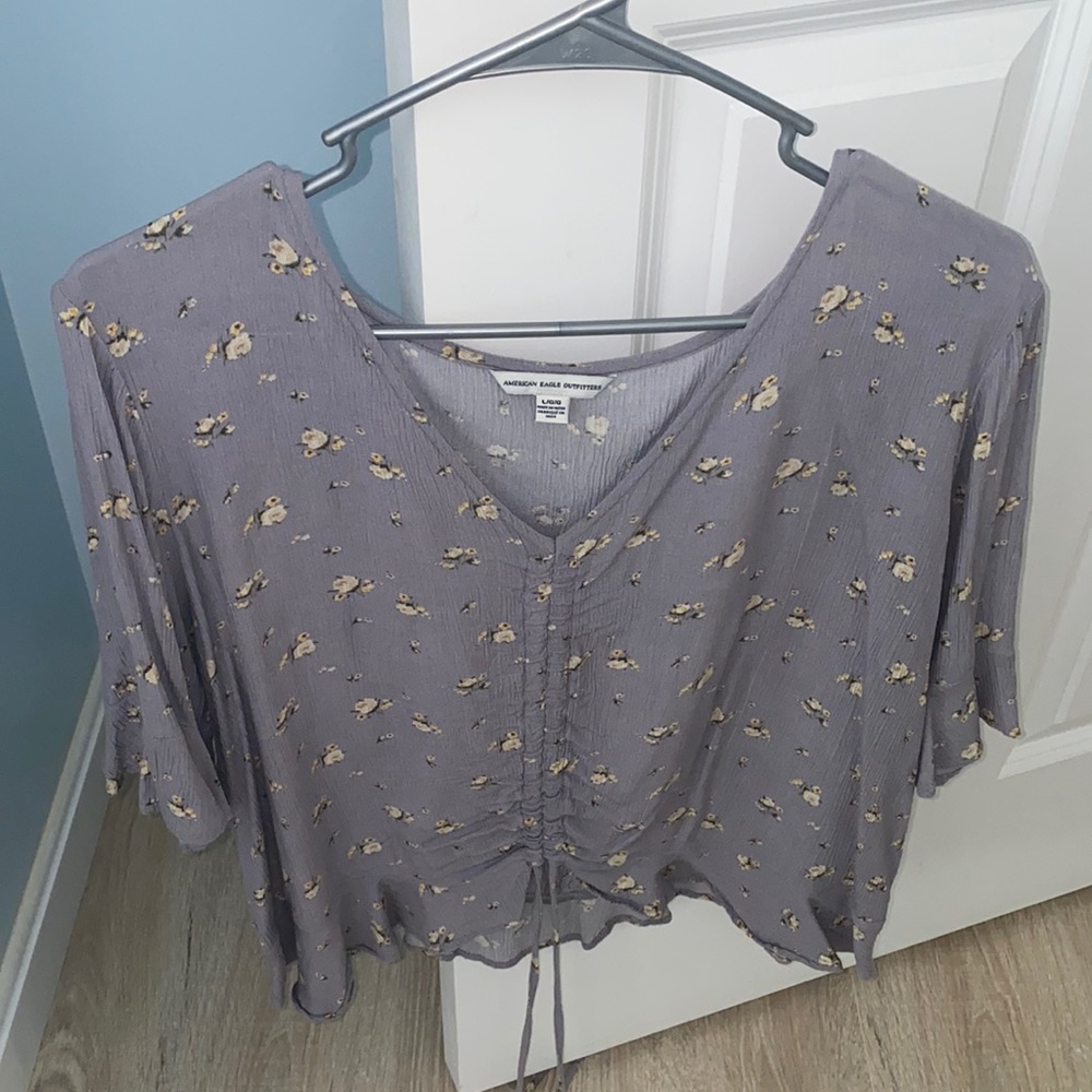 Purple blouse with yellow flowers
